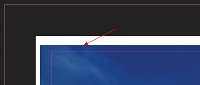 Screenshot indicating an incorrect position of a photo on a page in Affinity Publisher for PDF Upload A red arrow points to the edge of an incorrectly placed photo on a page in Affinity Publisher for PDF upload.