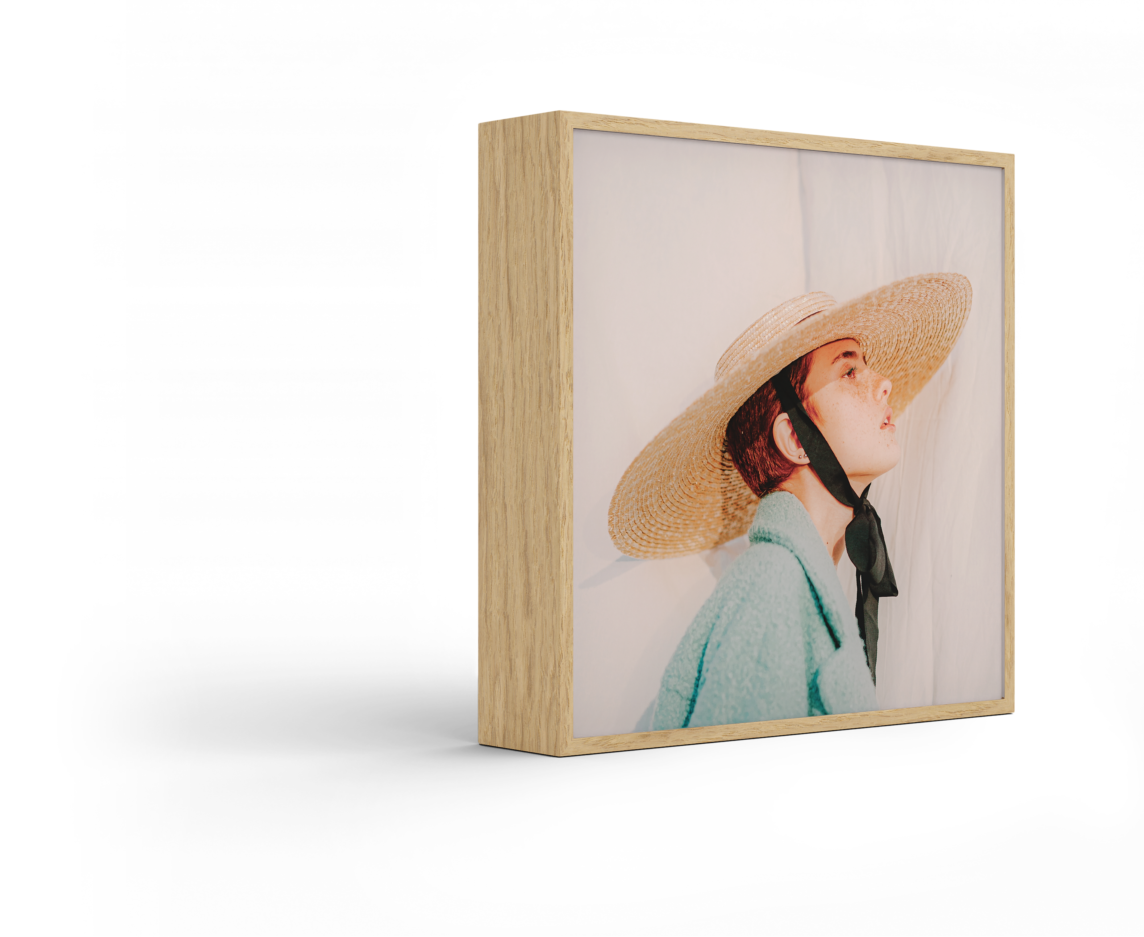 Standing ArtBox with frame color Natural oak against a white background.