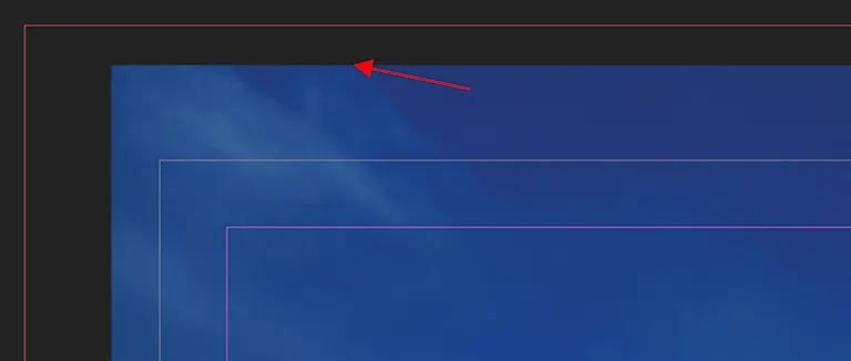 Screenshot indicating an incorrect position of a photo on a page in Affinity Publisher for PDF Upload A red arrow points to the edge of a photo outside the page in Affinity Publisher to show where the photo should not be placed.