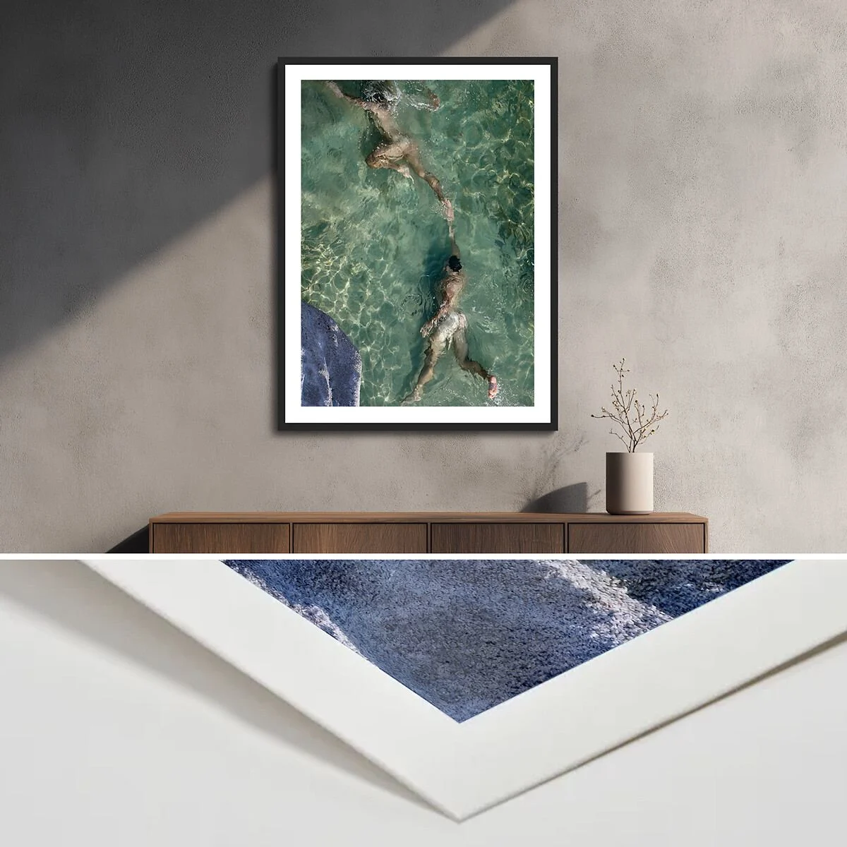 Passe-partout frame with a photo of two people swimming in the water. Close-up of a corner at the bottom. Passe-partout frame with a photo of two people swimming in the water. Close-up of a corner at the bottom.