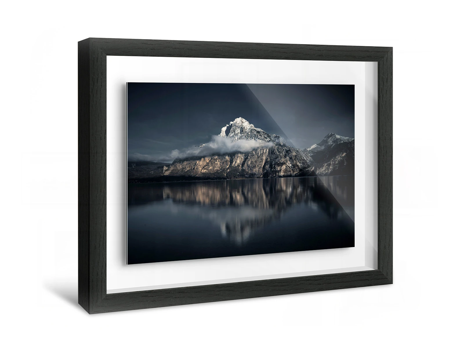 A mountain reflected in a lake in a Shadow Box Frame.