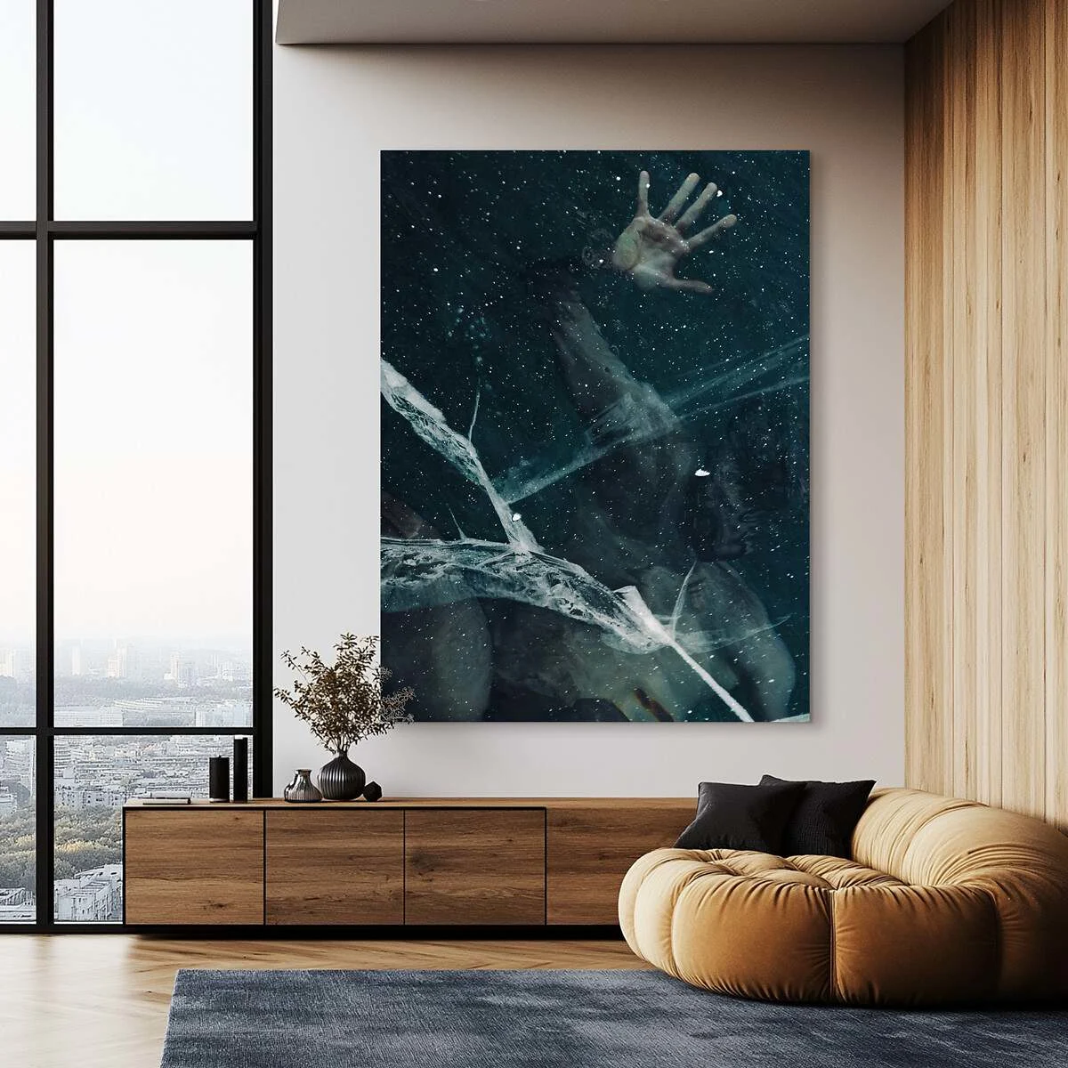 Photo print behind acrylic glass shows a hand underwater with air bubbles, hung in a modern living room. Photo print behind acrylic glass shows a hand underwater with air bubbles, hung in a modern living room.