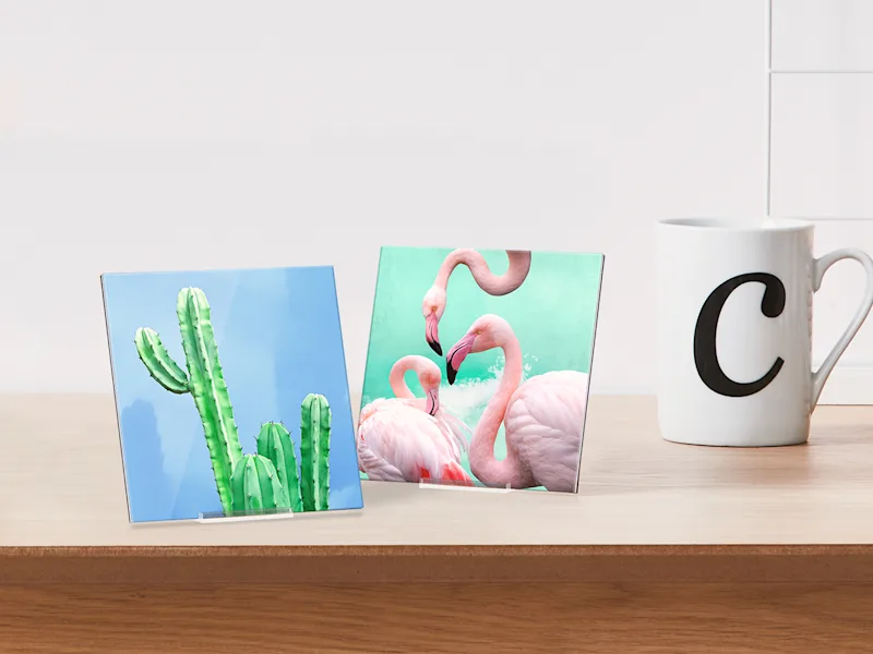 WhiteWall Acrylic Mini Two whitewall mini acrylic prints standing on a table next to a mug.