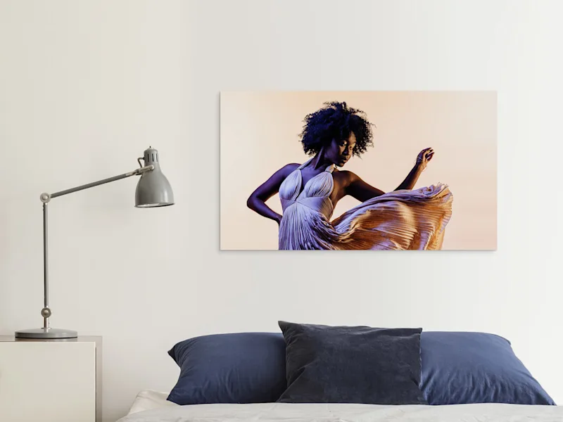 ChromaLuxe HD Metal Print 3 A dancing woman on an HD Metal Print on a wall in a living room.