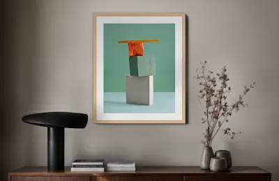Hahnemühle Platinum Certified Studio Hero Teaser Section Photo on wall on Hahnemühle Fine Art paper, shows three blocks in different colors, modern framed.