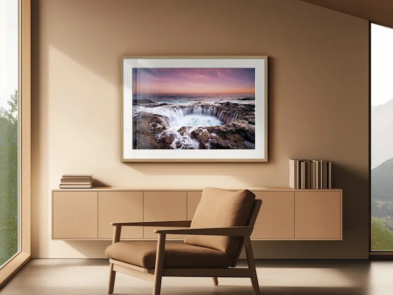 Metallic Photo Print On Fuji Crystal Pearl Fuji Crystal Pearl Metallic photo print showing cliffs by the sea, in a frame on a wall.
