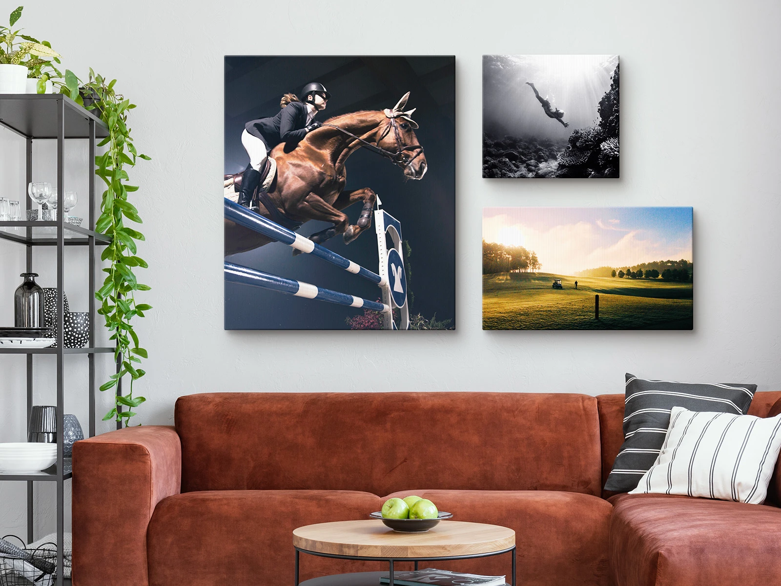 hanging of three textile prints on stretcher frames on a wall.