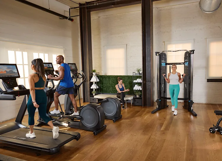 Exerciser on a Precor Treadmill