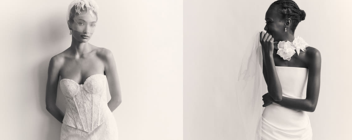 Two models in white bridal gowns, one in a lace corset and one in a strapless dress with veil and flower accessory