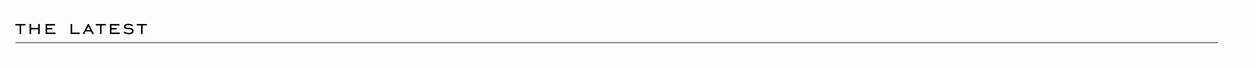 THE LATEST - Black text header on white background with thin horizontal line below