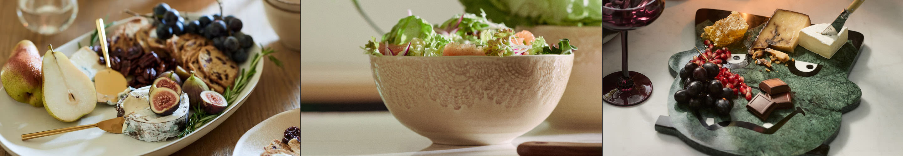 Three images showing gourmet food presentations: a cheese and fruit platter, a fresh salad in a ceramic bowl, and a cheese board with grapes and wine.