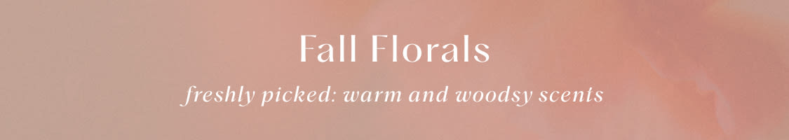 Fall Florals banner with text "freshly picked: warm and woodsy scents" on a peachy-tan gradient background
