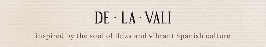 DE LA VALI logo in black text on beige background with tagline inspired by the soul of Ibiza and vibrant Spanish culture