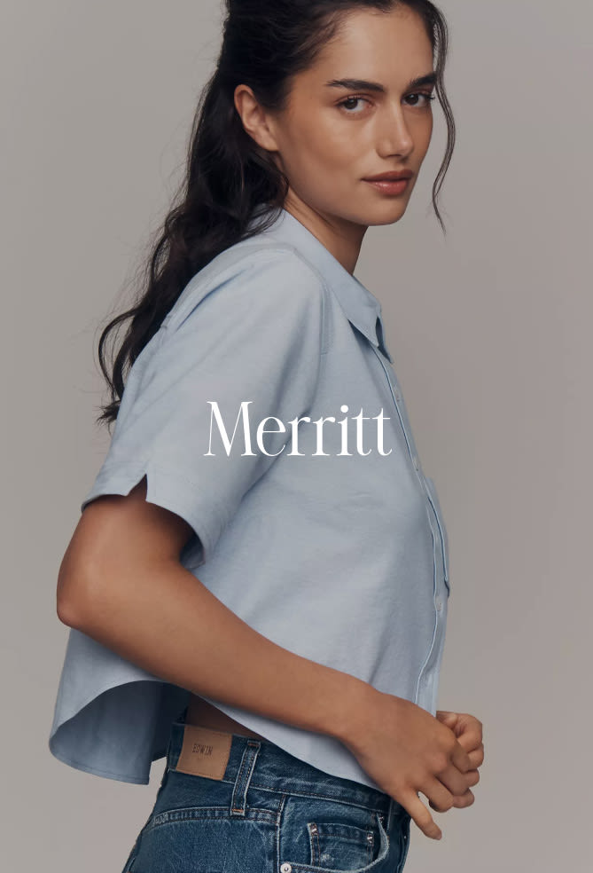 Woman in light blue short-sleeve shirt and jeans looking over shoulder with text "Merritt" overlaid on image.