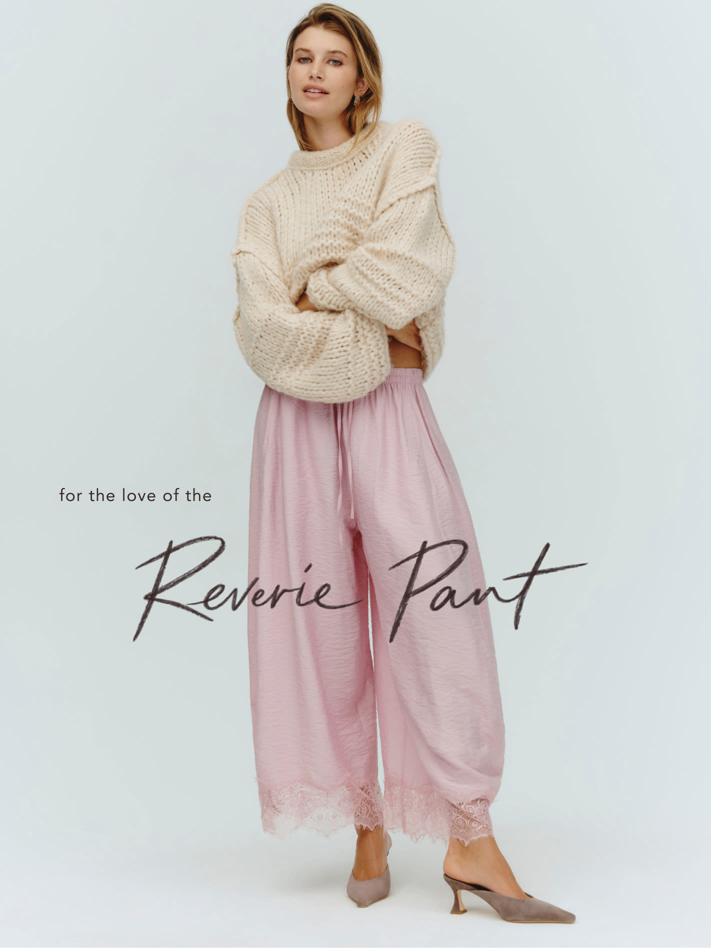 Woman wearing oversized beige knit sweater and pink wide-leg pants with lace trim. Text reads "for the love of the Reverie Pant"
