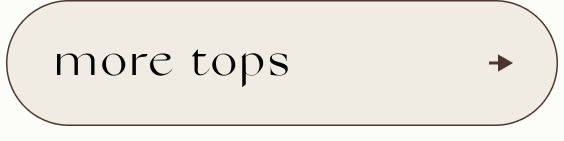 Beige rounded rectangular button with black text reading 'more tops' and a right-pointing arrow on the right side
