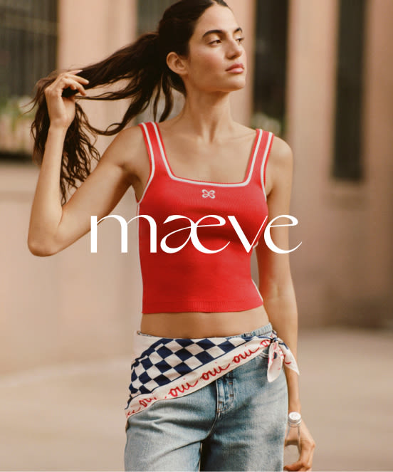 Woman in red crop top with white stripes touching her ponytail, wearing checkered wrap over jeans, with maeve logo overlay