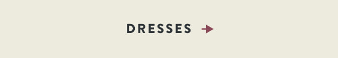 Text reading "DRESSES" in dark brown letters with a right-pointing arrow on