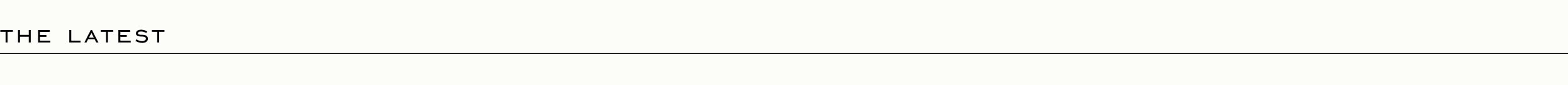 THE LATEST - Black text header on white background with thin horizontal line below
