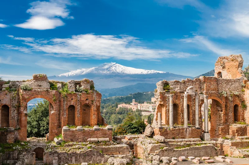 The Greek Theatre in Taormina with Mount Etna in the background. Sicily, Italy