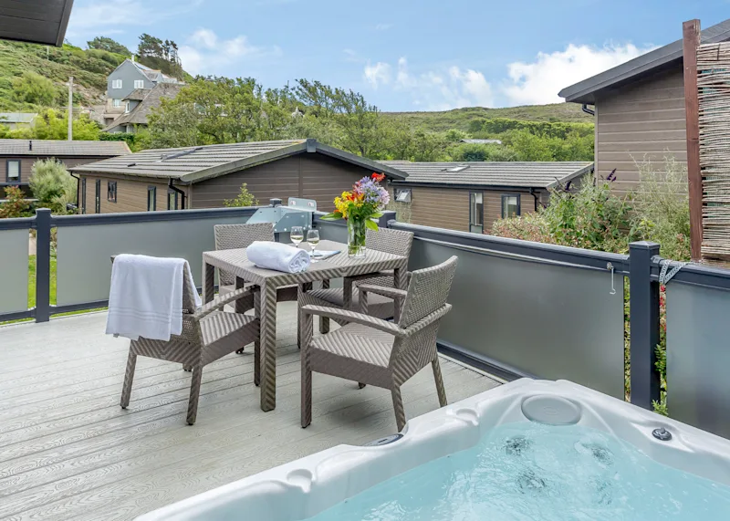 Hot tub lodge at Mullion Cove Coastal Retreat (MULC) in Mullion Cove, Helston, South Cornwall, England, UK