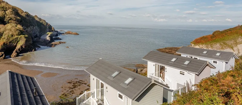 Sea view beach cabins at Beach Cove Coastal Retreat in Hele Bay, Ilfracombe, North Devon, UK