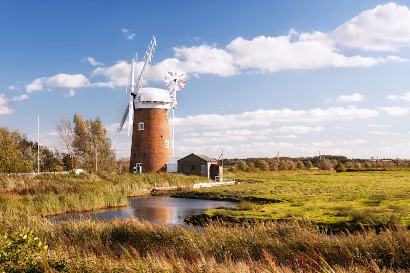 Horsey Windpump, a historic windmill on the Norfolk Broads, near Horsey, Norfolk, England, UK