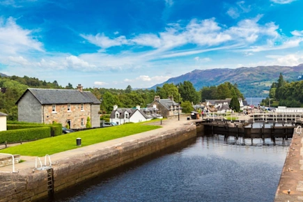 The Caledonian Canal running through Fort Augustus, a village on the southern tip of Loch Ness in the Scottish Highlands, Scotland, UK