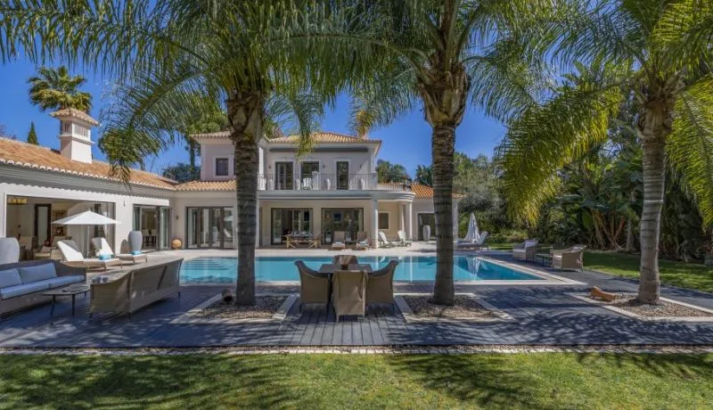 Carvoeiro town with colorful houses and yellow sand beach in Algarve, Portugal