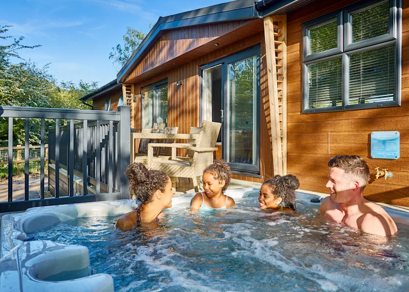 Hot tub lodge at Norfolk Woods Resort & Spa (NWRS) in Pentney, King’s Lynn, Norfolk, England, UK