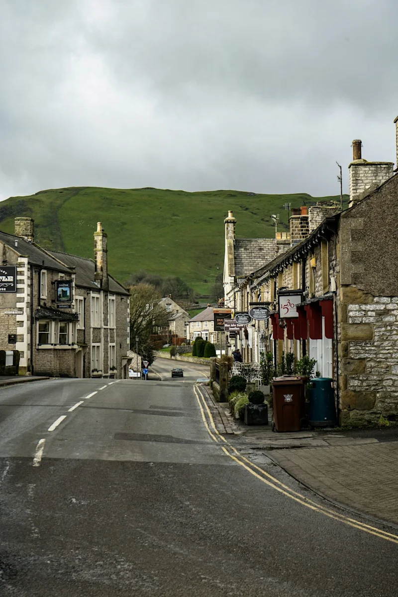View of a village street with a pub in the Peak District, Derbyshire, UK