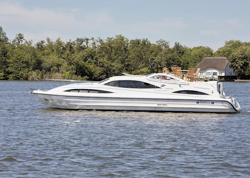 Brinks Lullaby, a mid-range cruiser at Barnes Brinkcraft boatyard in Wroxham on the Norfolk Broads, England, UK
