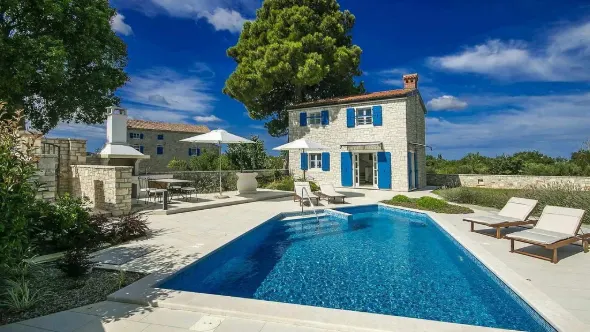 luxury villa with pool and outdoor oven