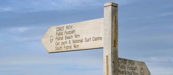 Signpost along the coastal path at Newquay