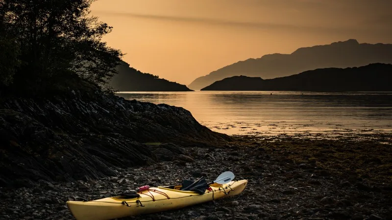 Kayak on a Beach by a Scottish Loch