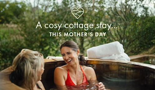 A delightful moment shared by friends in a bubbly hot tub, surrounded by a magical glow, symbolizing happiness, relaxation,