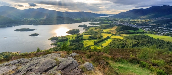 View from Walla Crag as the Sun rays shine down on Derwentwater in Cumbria