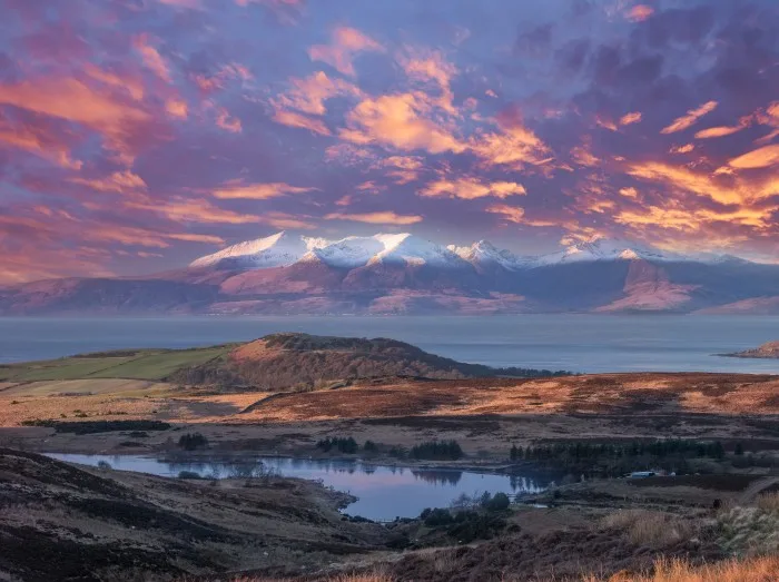 The Magnificent Isle of Arran at Sunset with a Blazing Red Sunset Sky.