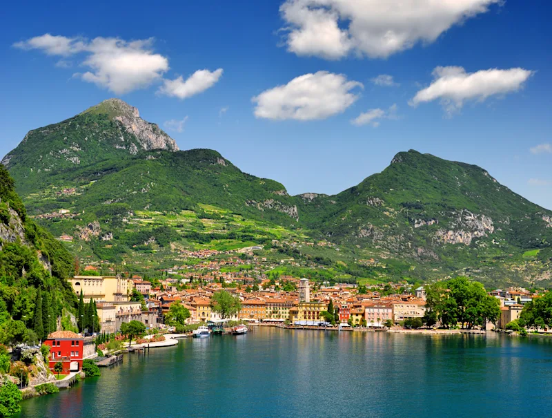 View of the town of Riva del Garda on Lake Garda, with the Italian Alps in the background