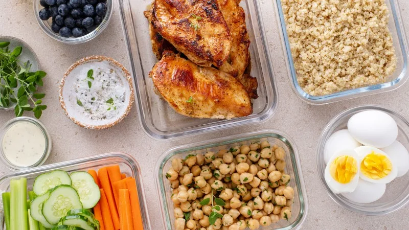 Healthy meal prep containers on kitchen counter