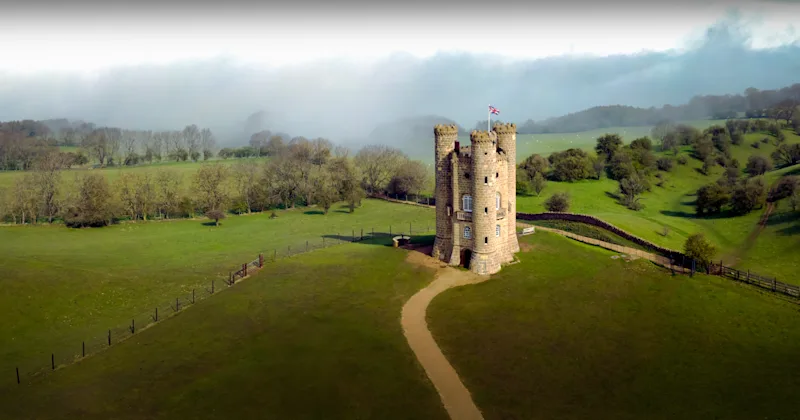 Broadway Tower at the top of the Cotswolds escarpment, part of the Cotswold Way route from Chipping Campden to Broadway, Cotswolds, England, UK