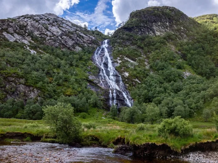 Beautiful walk on a sunny summer day to the Steall falls near the town of Fort William