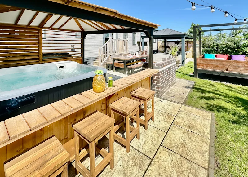 Hot tub lodge at Raywell Hall Country Lodges (RAYW) in Raywell, Beverley, Yorkshire Moors and Coast, England, UK