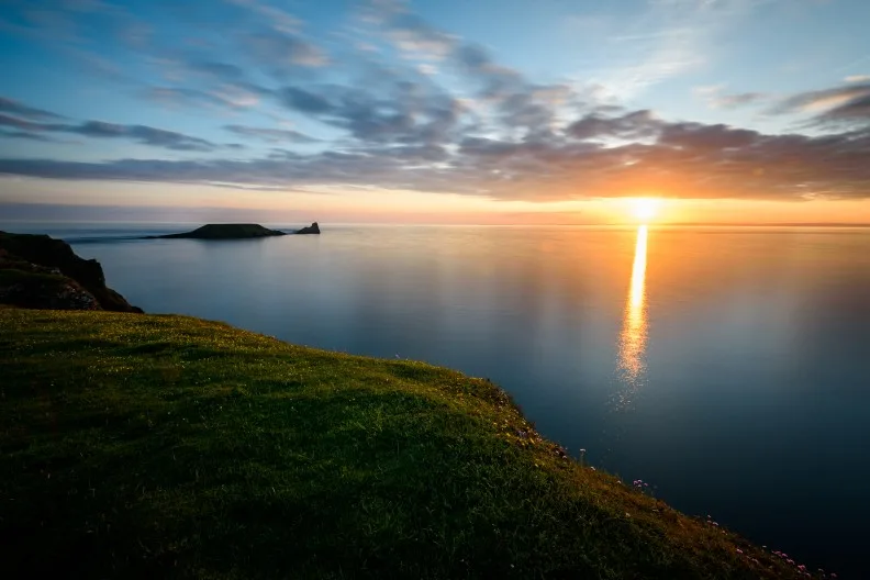 Sunset at Rhossili Bay, Gower Peninsula, Wales, UK