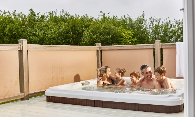 Hot tub lodge at Piran Meadows Resort (SUML), Newquay, Cornwall, England, UK