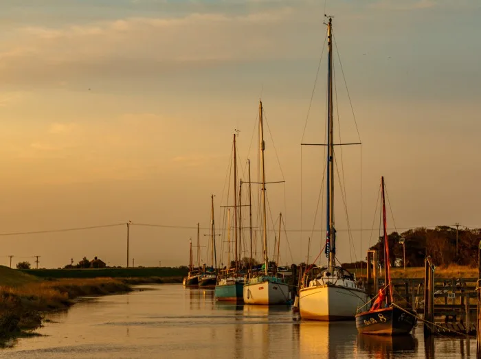 Boats on the River Steeping at Gibraltar Point Lincolnshire.