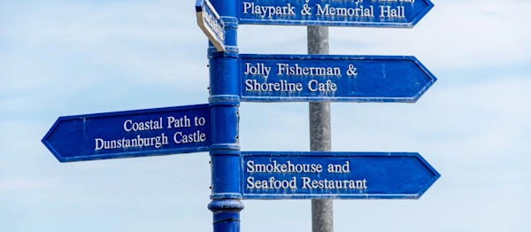 Street sign and directions in fishing village Craster. Northumberland