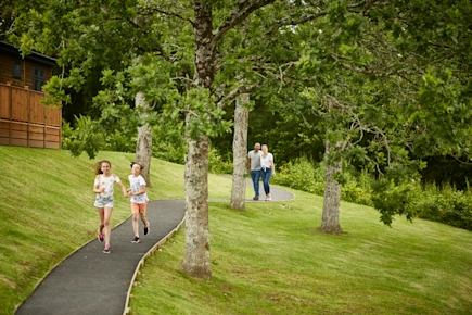 Family having fun in the grounds of Finlake Resort & Spa (FINL) in Newton Abbott, Devon