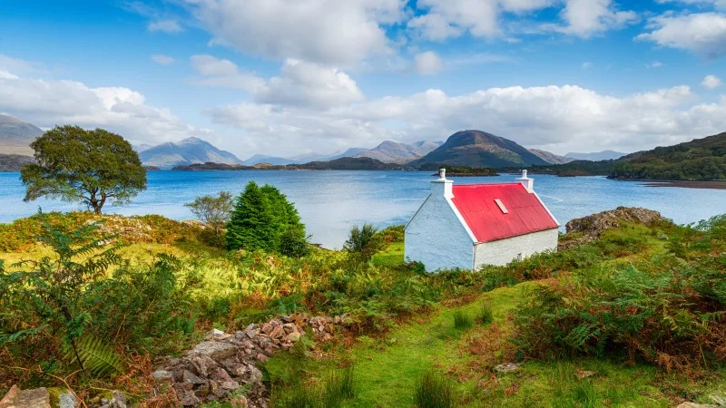 A pretty red roofed croft on the Applecross Peninsula