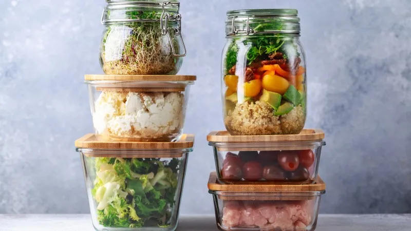 Glass boxes and cans with fresh food refrigerator storage concept decanting